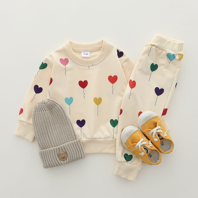 Featured image for ‘Off white All over Hearts Printed Sweatshirt with Trouser For Kids Baby & Baba Both’